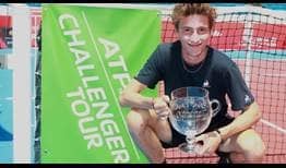 Ugo Humbert celebrates his maiden ATP Challenger Tour title in Segovia, Spain.