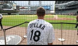Reilly Opelka throws out the first pitch at the Chicago White Sox game.