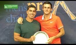 Tommy Paul celebrates his maiden ATP Challenger Tour title with coach Diego Moyano in Charlottesville. 