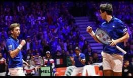 Pierre-Hugues Herbert and Nicolas Mahut defeat Ivan Dodig and Mate Pavic in four sets in the Davis Cup final on Saturday.