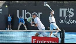 Bob Bryan and Mike Bryan fall in three sets to Robert Lindstedt and Milos Raonic on their return to action at the Brisbane International on Tuesday.