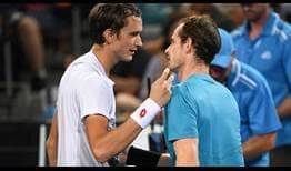 Andy Murray (right) congratulates Daniil Medvedev at the net on Wednesday after their second-round match in Brisbane.
