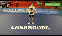 Ugo Humbert lifts his fourth ATP Challenger Tour trophy, prevailing on home soil in Cherbourg.