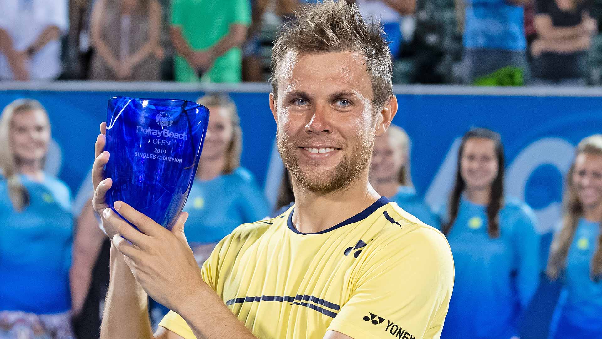 Radu Albot lifts his first ATP Tour trophy.