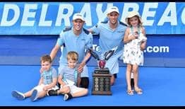 Bob Bryan and Mike Bryan celebrate their 117th tour-level title as a team with Bob's three children in Delray Beach.
