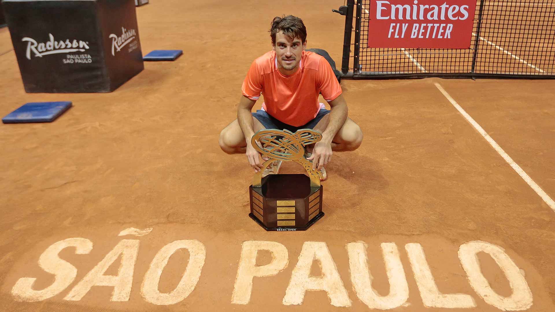 Guido Pella poses with his first ATP Tour trophy in Sao Paulo