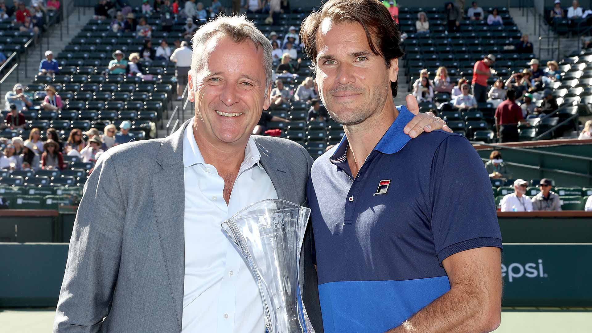 ATP Executive Chairman & President <a href='https://www.atptour.com/en/players/chris-kermode/k007/overview'>Chris Kermode</a> presents <a href='https://www.atptour.com/en/tournaments/indian-wells/404/overview'>BNP Paribas Open</a> Tournament Director <a href='https://www.atptour.com/en/players/tommy-haas/h355/overview'>Tommy Haas</a> with the ATP Masters 1000 Tournament of the Year trophy in the 2018 ATP Awards. 