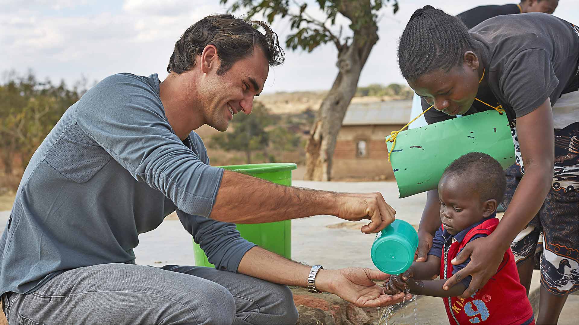 <a href='https://www.atptour.com/en/players/roger-federer/f324/overview'>Roger Federer</a> during a visit to Malawi 