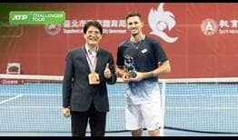 Dennis Novak lifts his first ATP Challenger Tour trophy, prevailing in Taipei City.