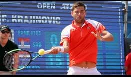 Qualifier Filip Krajinovic saved seven of nine break points to beat second seed Borna Coric on Friday in Budapest.