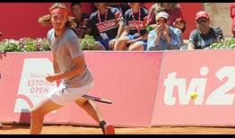 Stefanos Tsitsipas makes a last ditch attempt to return a shot against Joao Domingues on Friday in Estoril.