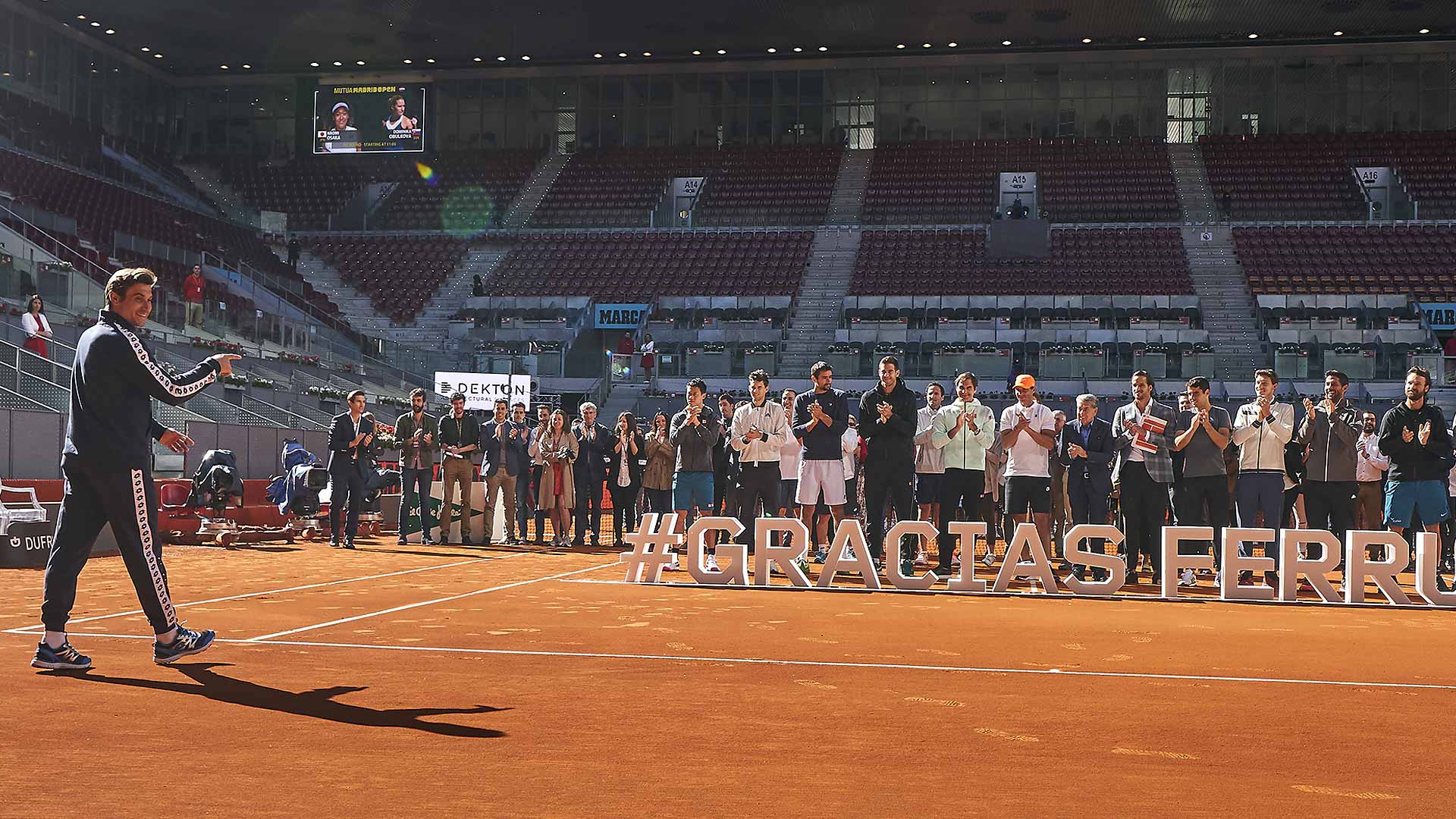 <a href='https://www.atptour.com/en/players/david-ferrer/f401/overview'>David Ferrer</a> walks on court at La Caja Magica for a special ceremony in his honour ahead of his final tournament in Madrid