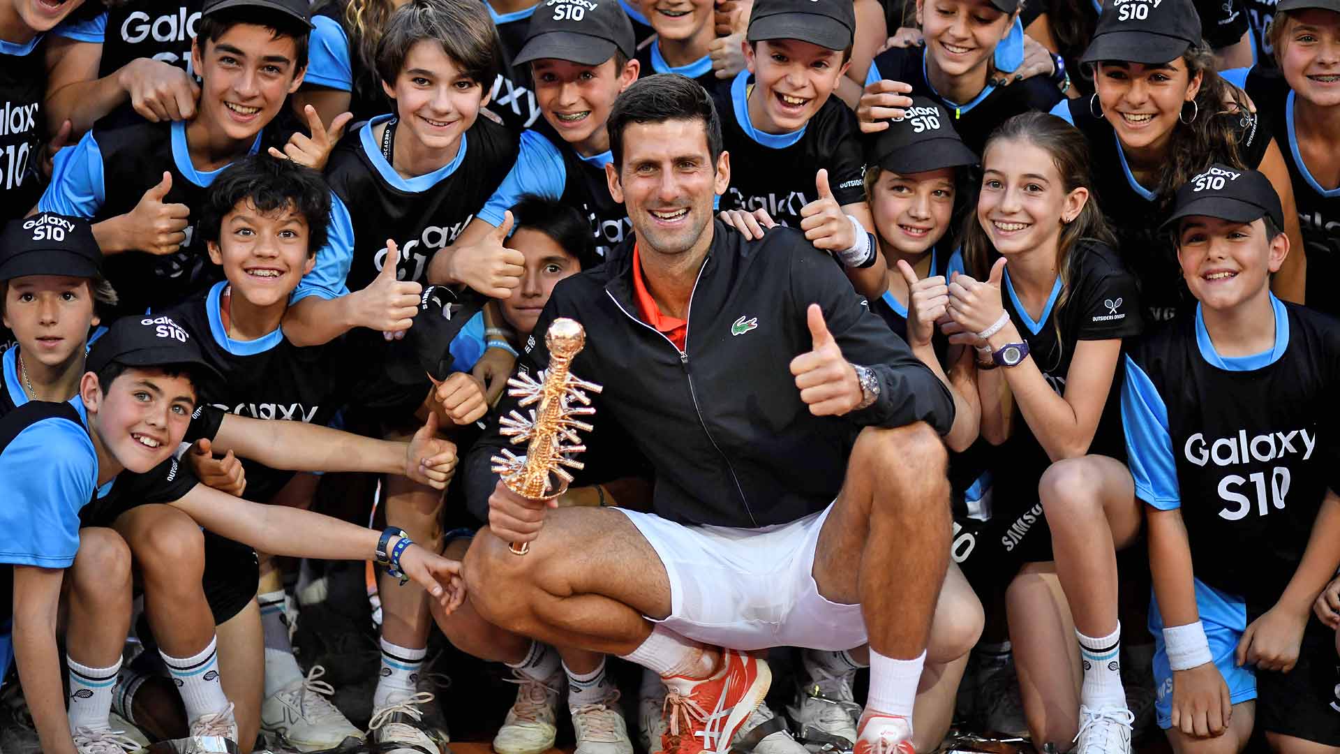 Novak Djokovic celebrates his Madrid title