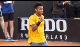 Felix Auger-Aliassime saves all five break points he faces to beat John Millman at the Open Parc Auvergne-Rhone-Alpes Lyon on Tuesday.