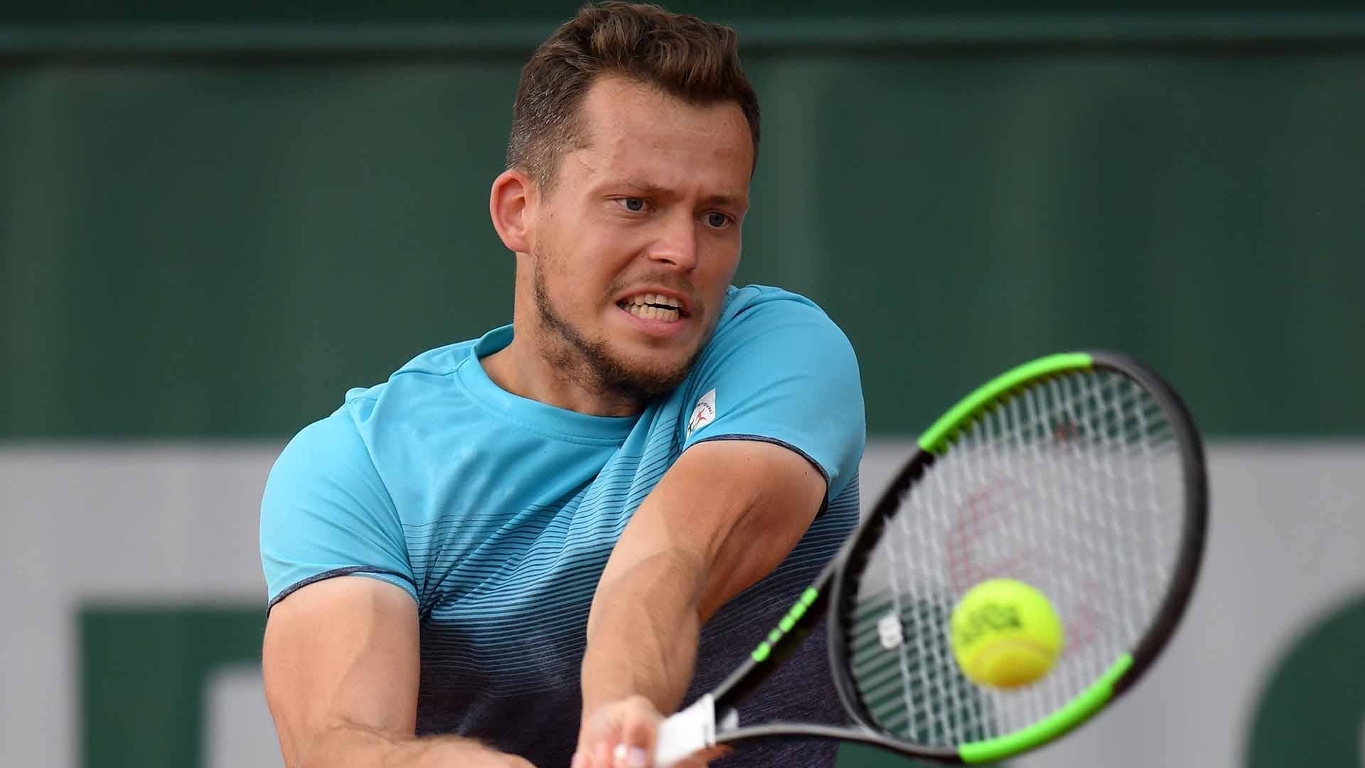 Adam Pavlasek breaks Ryan Harrison on four occasions to reach the second qualifying round at Roland Garros on Tuesday.