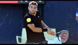 Borna Coric saves one match point to beat Cristian Garin at the Libema Open on Friday.
