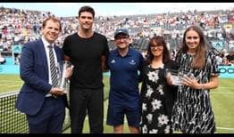  Tournament Director Stephen Farrow receives a trophy from Mark Philippoussis, recognising the Fever-Tree Championships as the ATP 500 Tournament of the Year in the 2018 ATP Awards.