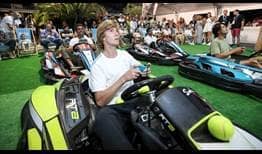 Russian Andrey Rublev, who won the Umag title in 2017, takes part in a video game race during the Players Party.
