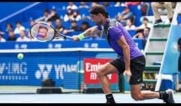 Fourth seed Grigor Dimitrov saves three of four break points on Thursday to beat Daniel Evans in Chengdu.