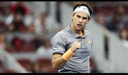 Dominic Thiem celebrates beating 2016 champion Andy Murray on Friday for a place in the Beijing semi-finals.