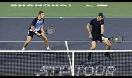 Neal Skupski and Jamie Murray save all three break points they face to eliminate Novak Djokovic and Filip Krajinovic in Shanghai.