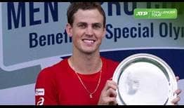 Vasek Pospisil lifts his second straight Challenger trophy, prevailing in Charlottesville.