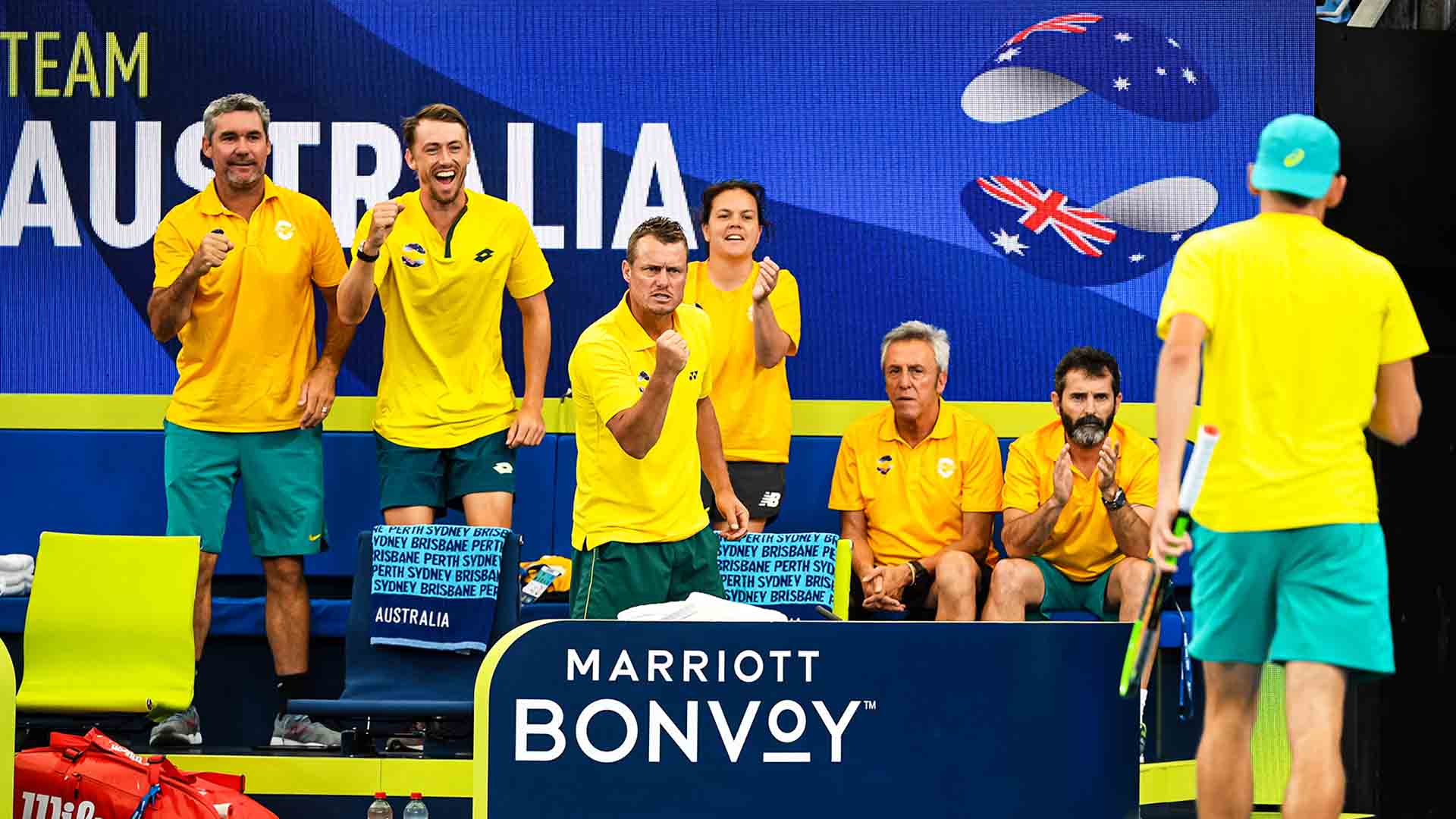 Members of Team Australia support <a href='https://www.atptour.com/en/players/alex-de-minaur/dh58/overview'>Alex de Minaur</a> from the Team Zone at the <a href='https://www.atptour.com/en/tournaments/atp-cup/8888/overview'>ATP Cup</a> on Thursday.