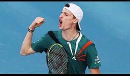 Ugo Humbert defeats two-time champion John Isner in straight sets at the ASB Classic on Friday.