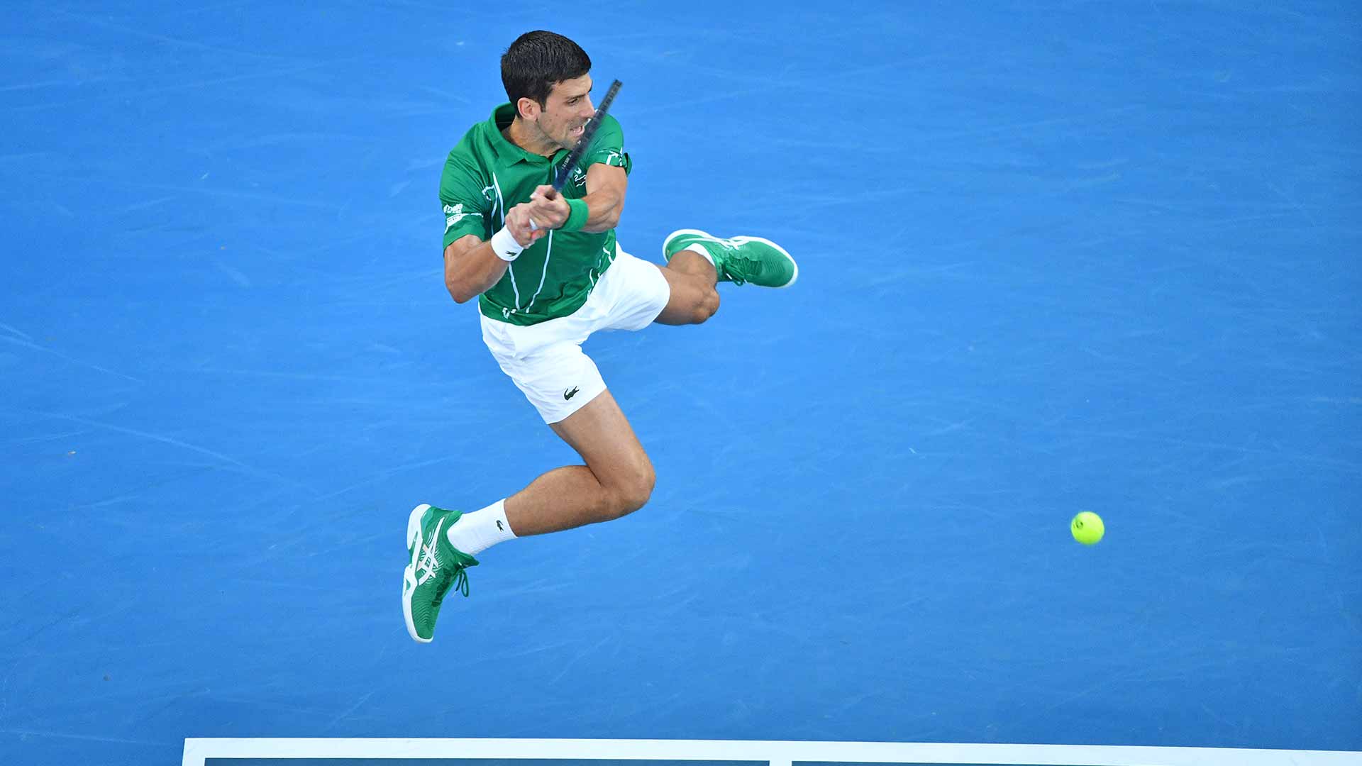 Novak Djokovic battles back in the first set en route to beating Roger Federer on Thursday for a place in his eighth Australian Open final.