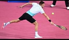 Seventh seed Filip Krajinovic saves two set points in the second set on Friday to beat Gregoire Barrere in Montpellier.