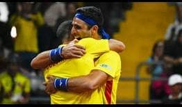 Juan Sebastian Cabal (above) and Robert Farah earn a critical doubles point for Colombia against Argentina.