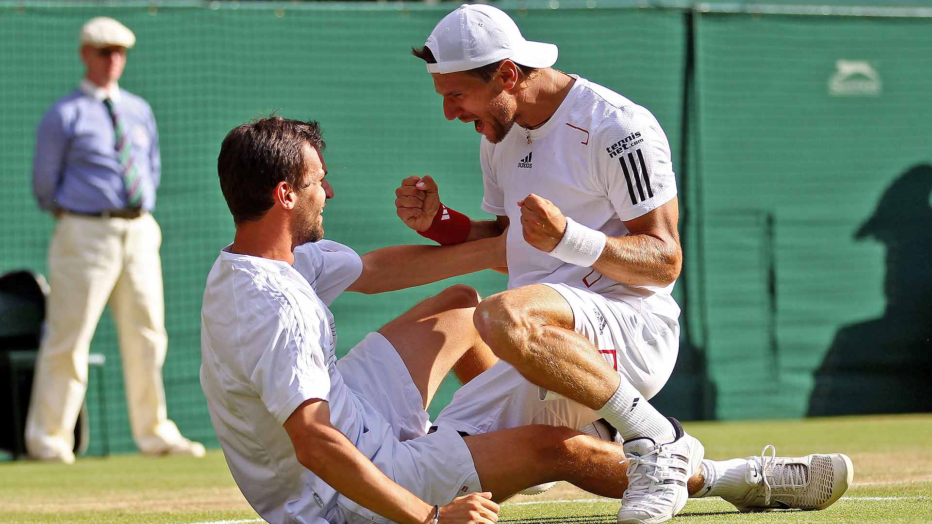 Philipp Petzschner and Jurgen Melzer celebrate their 2010 Wimbledon title.