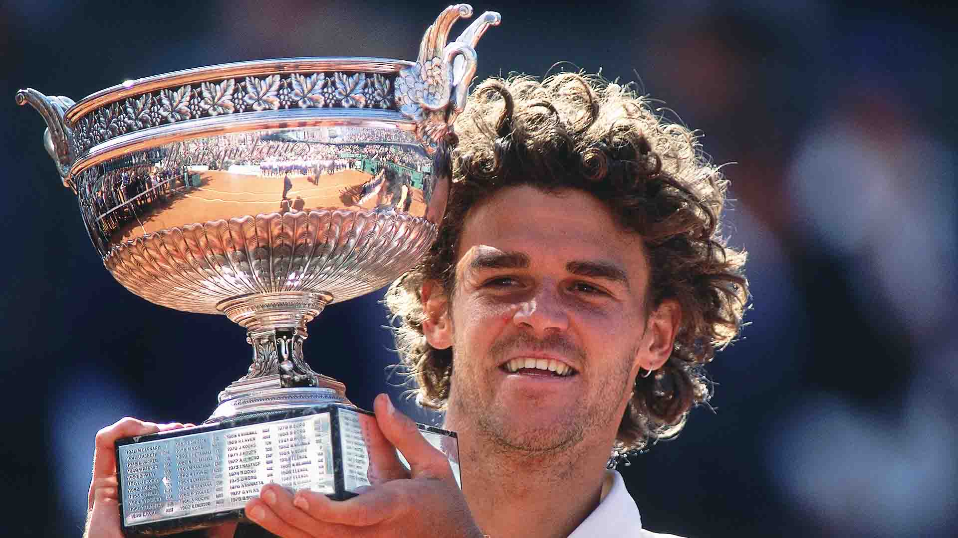 Gustavo Kuerten beat Alex Corretja in four sets to win his third Roland Garros crown in 2001.