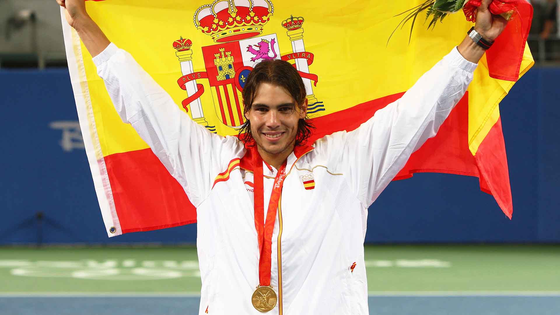 <a href='https://www.atptour.com/en/players/rafael-nadal/n409/overview'>Rafael Nadal</a> beats <a href='https://www.atptour.com/en/players/fernando-gonzalez/g415/overview'>Fernando Gonzalez</a> to win the men's singles gold medal at the 2008 Beijing Olympics.