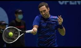 Mikhail Kukushkin battles hard on Wednesday for a  second-round victory over top seed Benoit Paire in Nur-Sultan.