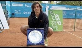 Lorenzo Musetti lifts his first ATP Challenger Tour trophy in Forli, Italy.