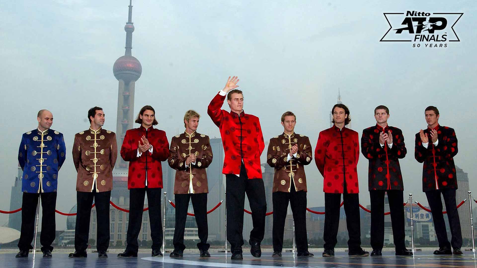 The 2002 Tennis Masters Cup competitors take a photo before the event's first edition in Shanghai.