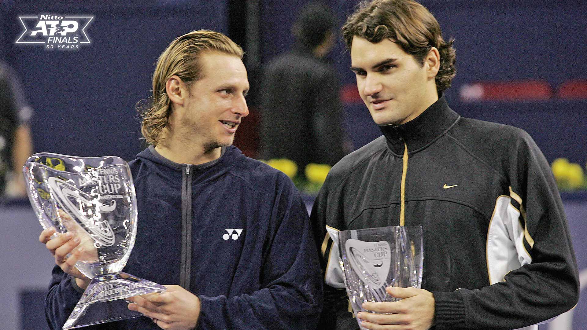 World's number one player, Switzerland's Roger Federer prepares to serve a  ball against Argentina's David Nalbandian (unseen) during the opening match  for the Shanghai Tennis Masters Cup held at the Qi Zhong