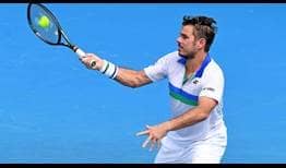 Stan Wawrinka rallies from a break down late in the third set to beat Alex Bolt on Friday.