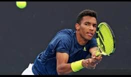 Felix Auger-Aliassime saves a match point on his serve in the third set en route to a win against Egor Gerasimov at the Murray River Open.