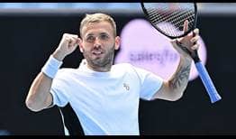 Daniel Evans celebrates beating Felix Auger-Aliassime on Sunday for his first ATP Tour title at the Murray River Open.