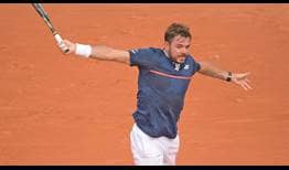 Stan Wawrinka hits a backhand at 2020 Roland Garros.