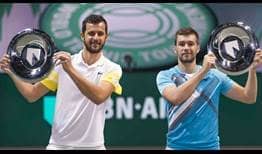 Nikola Mektic (right) and Mate Pavic (left) capture their third title of 2021 on Sunday at the ABN AMRO World Tennis Tournament.