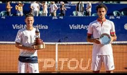 Champion Diego Schwartzman and runner-up Francisco Cerundolo pose with their Argentina Open trophies.