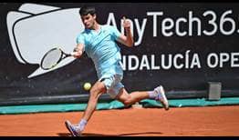 Carlos Alcaraz earns his fifth match win of the year on Tuesday to advance to the Marbella second round.