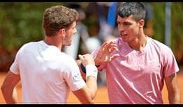 Pablo Carreno Busta and Carlos Alcaraz save four of the five break points they face to defeat Wesley Koolhof and Lukasz Kubot on Monday in Barcelona.