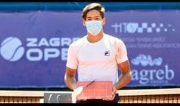 Sebastian Baez lifts his third ATP Challenger trophy, prevailing in Zagreb.