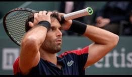 Pablo Andujar reacts to beating top seed Roger Federer on Tuesday in Geneva.