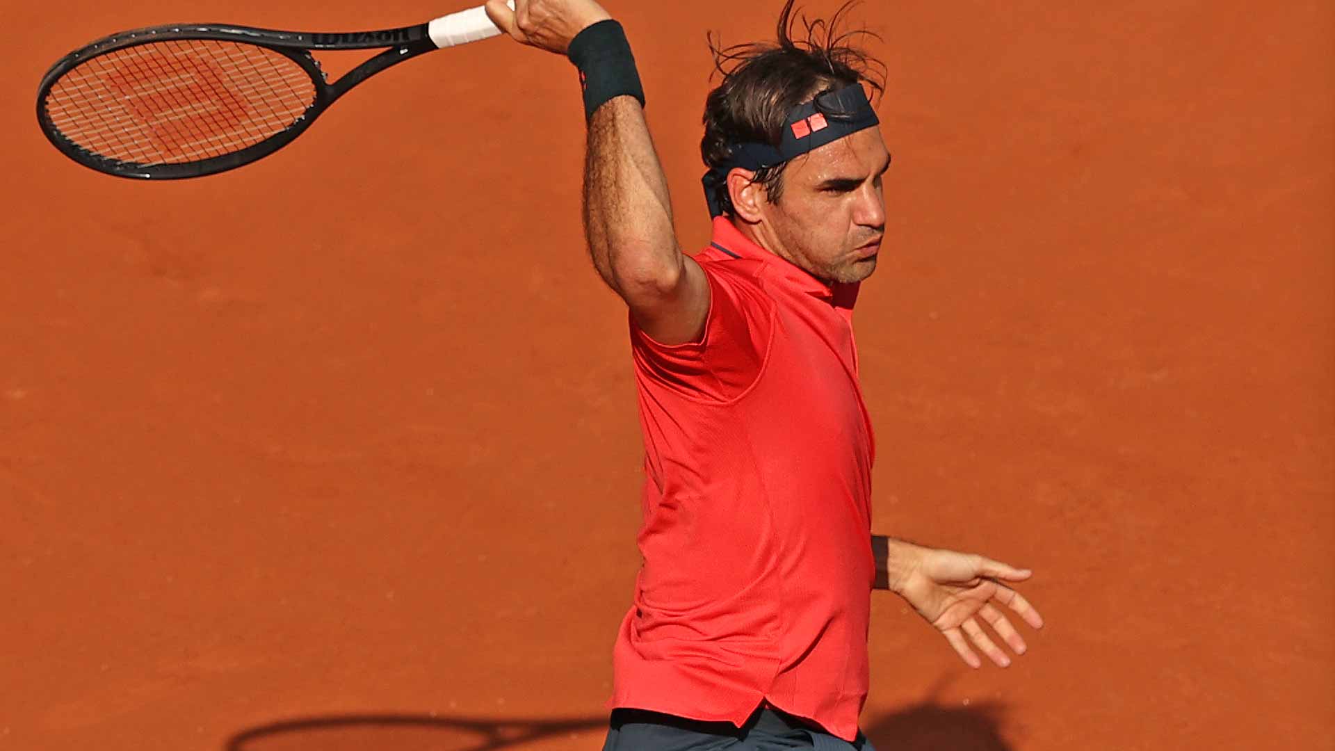 Roger Federer hits 47 winners en route to a four-set win against Marin Cilic on Thursday.
