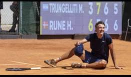 Holger Rune celebrates his first ATP Challenger Tour title in Biella, Italy.